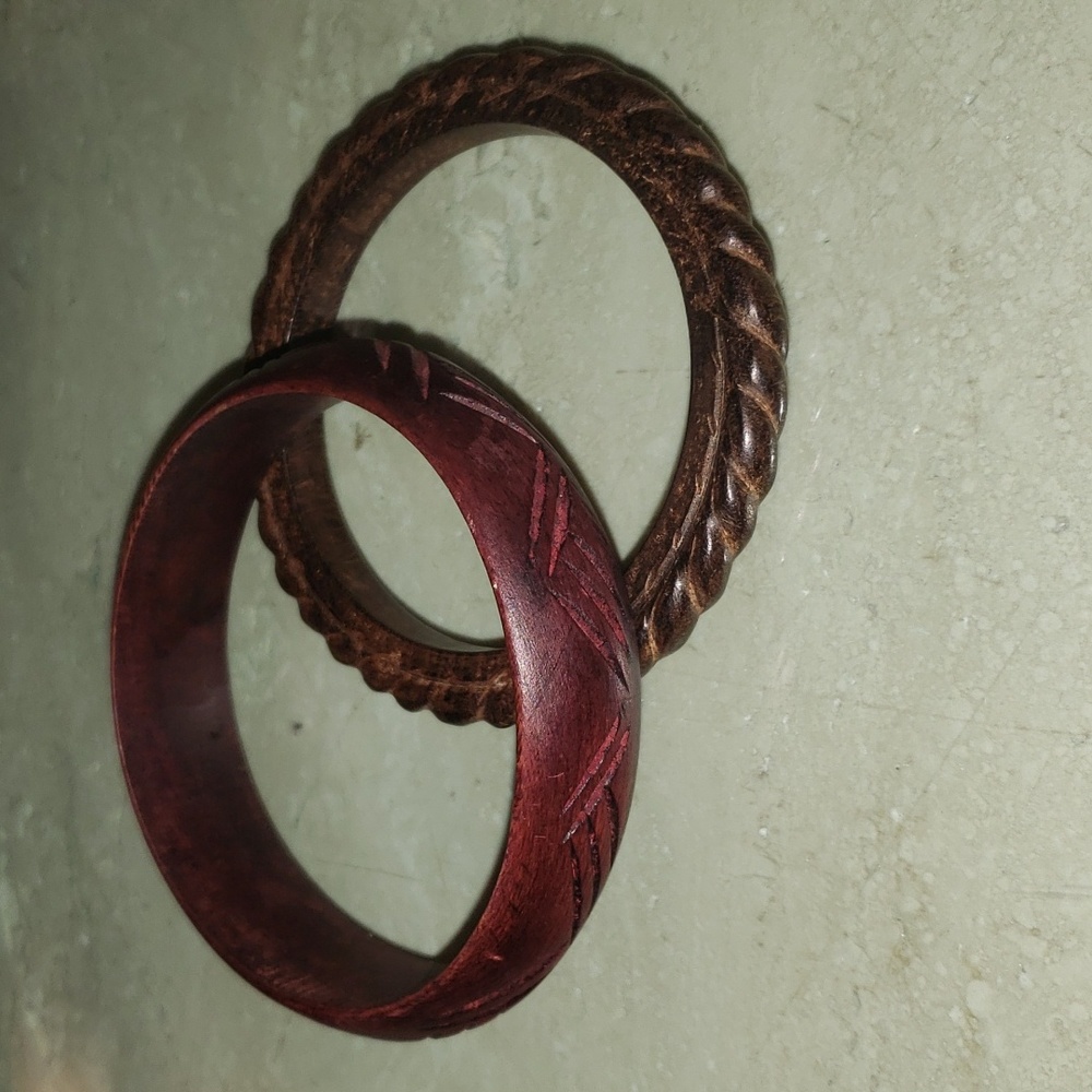 A pair of wooden bagels carved